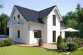 Modernes Einfamilienhaus mit Garten, Dachterrasse und weißer Fassade, ideal für Heimwerkerprojekte und Renovierungsanleitungen.